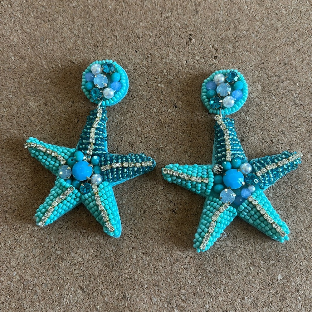 NWOT Turquoise blue beaded starfish earrings.  Great statement jewelry!